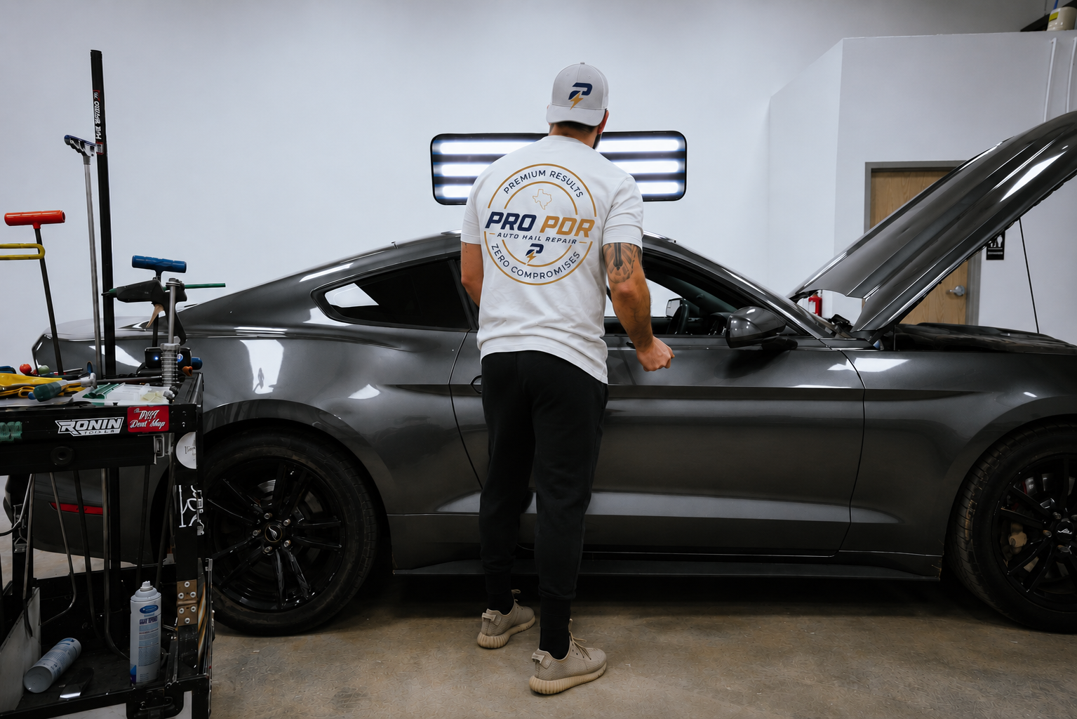 Pro PDR collision repair technician at Houston shop