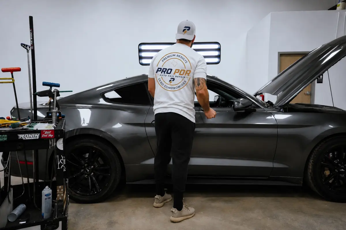 Pro PDR paint correction specialist at Houston shop